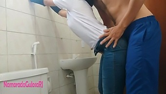 Brunette Gets Surprised By Big Dick In Bathroom Stall
